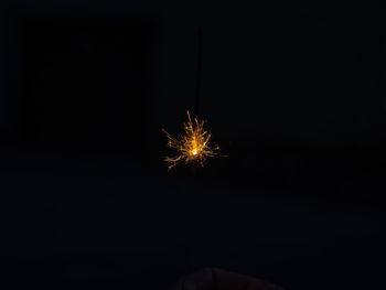 Firework display at night