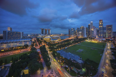 High angle view of illuminated cityscape against sky