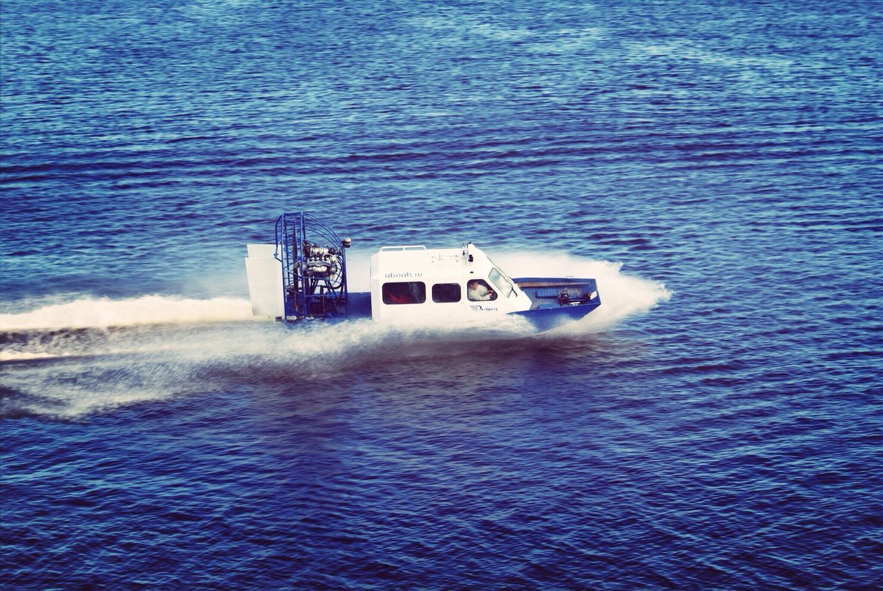 water, sea, waterfront, nautical vessel, transportation, mode of transport, boat, rippled, sailing, blue, nature, tranquility, high angle view, travel, beauty in nature, day, outdoors, scenics, tranquil scene, no people