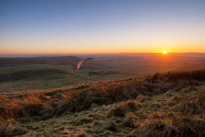 Scenic view of sunset against sky