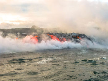 Active volcano by sea