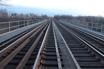 Railroad tracks against sky