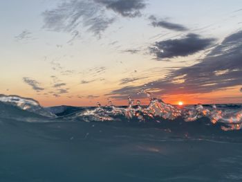 Scenic view of mountains against sky during sunset