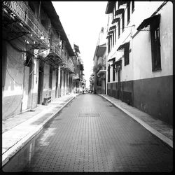 Narrow alley along buildings