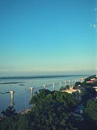 Scenic view of sea against clear blue sky