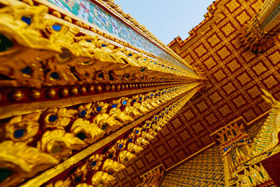 Low angle view of ornate building against sky