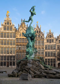 Statue of historic building against sky