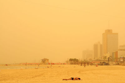 Panoramic view of city against clear sky during sunset