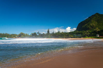 Scenic view of haena beach park on the hawaiian island of kauai, usa against blue sky