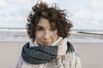 Portrait of smiling woman on the beach