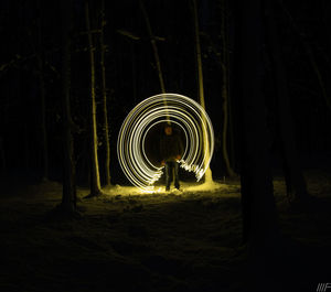 Light trails on field at night