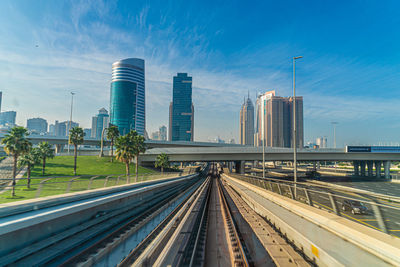 High angle view of highway in city against sky