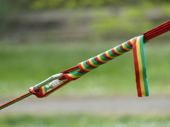 Close-up of clothesline hanging on rope