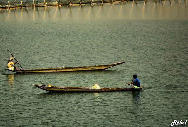 water, men, nautical vessel, transportation, lifestyles, leisure activity, waterfront, mode of transport, boat, fishing, rippled, oar, lake, nature, river, sailing, travel