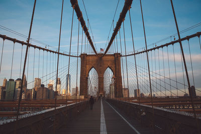 Brooklyn bridge against sky in city