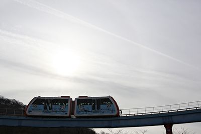 Low angle view of train against sky