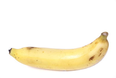 Close-up of fruit against white background