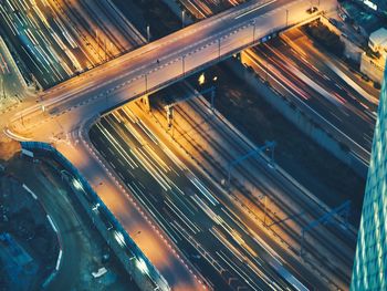 High angle view of light trails on road in city