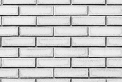 Black brick wall pattern texture for background.