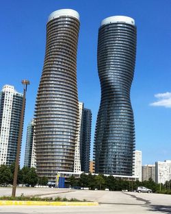 Modern skyscrapers against blue sky