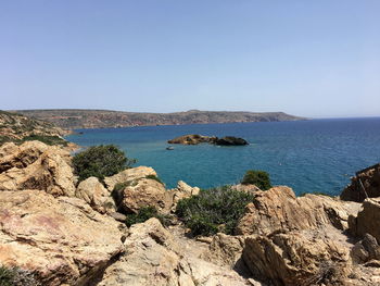 Scenic view of sea against clear blue sky