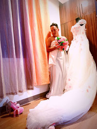 Woman holding flower bouquet