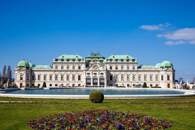 Facade of historic building against blue sky