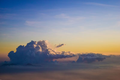 Scenic view of dramatic sky during sunset