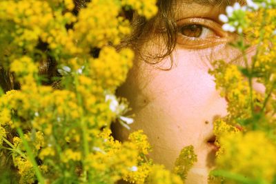 Portrait of person on flowering plant