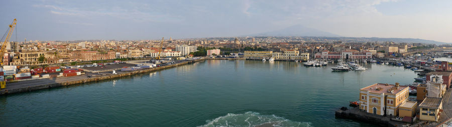 High angle view of river amidst buildings in city