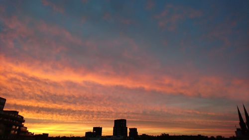 Silhouette of buildings at sunset