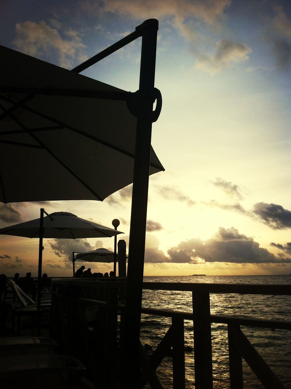 water, sky, pier, sea, sunset, silhouette, built structure, tranquility, cloud - sky, tranquil scene, nature, scenics, railing, wood - material, jetty, lake, beauty in nature, river, dusk, architecture