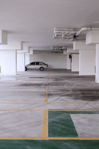 Empty parking lot against building