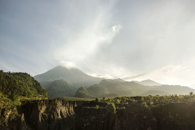 Panoramic view of landscape and mountains against sky