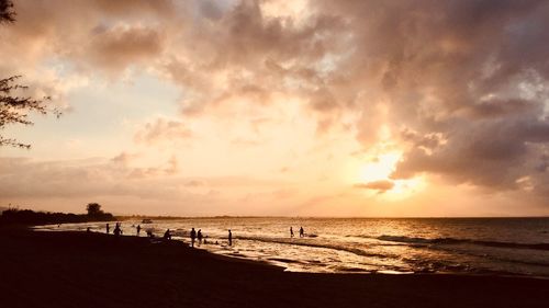 Scenic view of beach during sunset