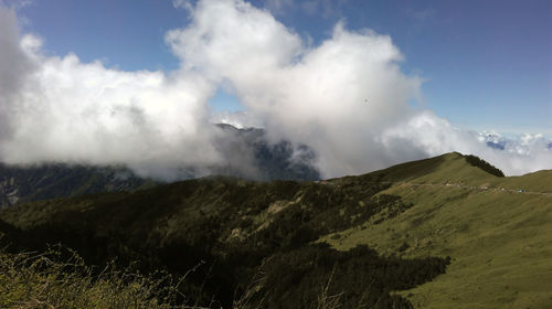 Scenic view of volcanic mountain against sky