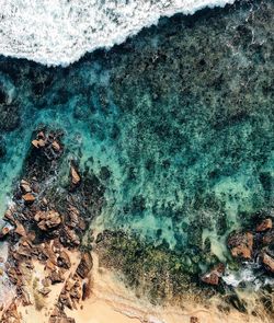 High angle view of rocks on beach