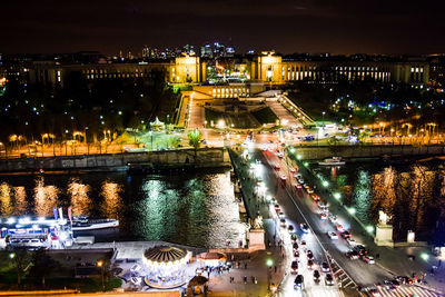 High angle view of illuminated city buildings at night