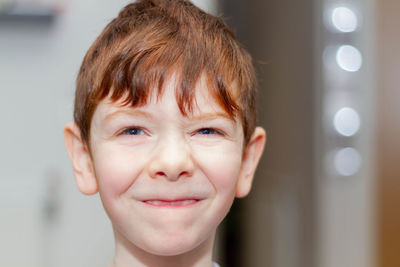 Close-up portrait of smiling boy