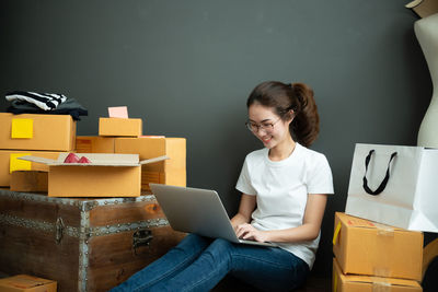 Young woman using mobile phone