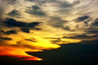 Low angle view of dramatic sky during sunset