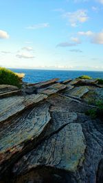 Scenic view of sea against cloudy sky