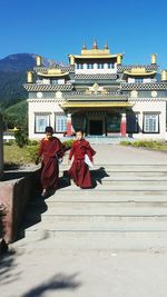 Low angle view of temple in front of building