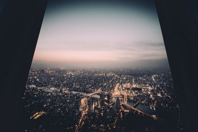 Aerial view of illuminated cityscape