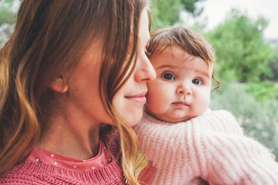 Portrait of mother and baby girl