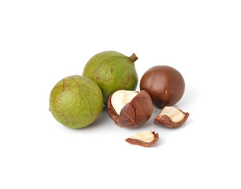 Close-up of fruits against white background