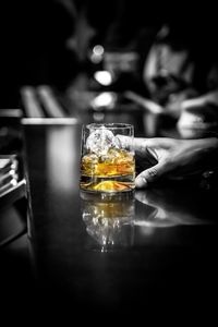 Close-up of beer glass on table