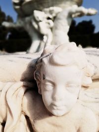 Close-up of angel statue outdoors
