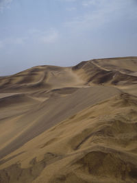 Scenic view of desert against sky