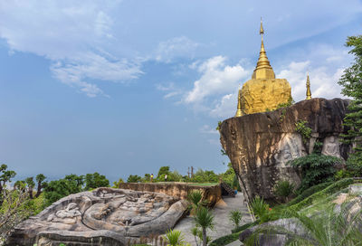 Panoramic view of temple building against sky